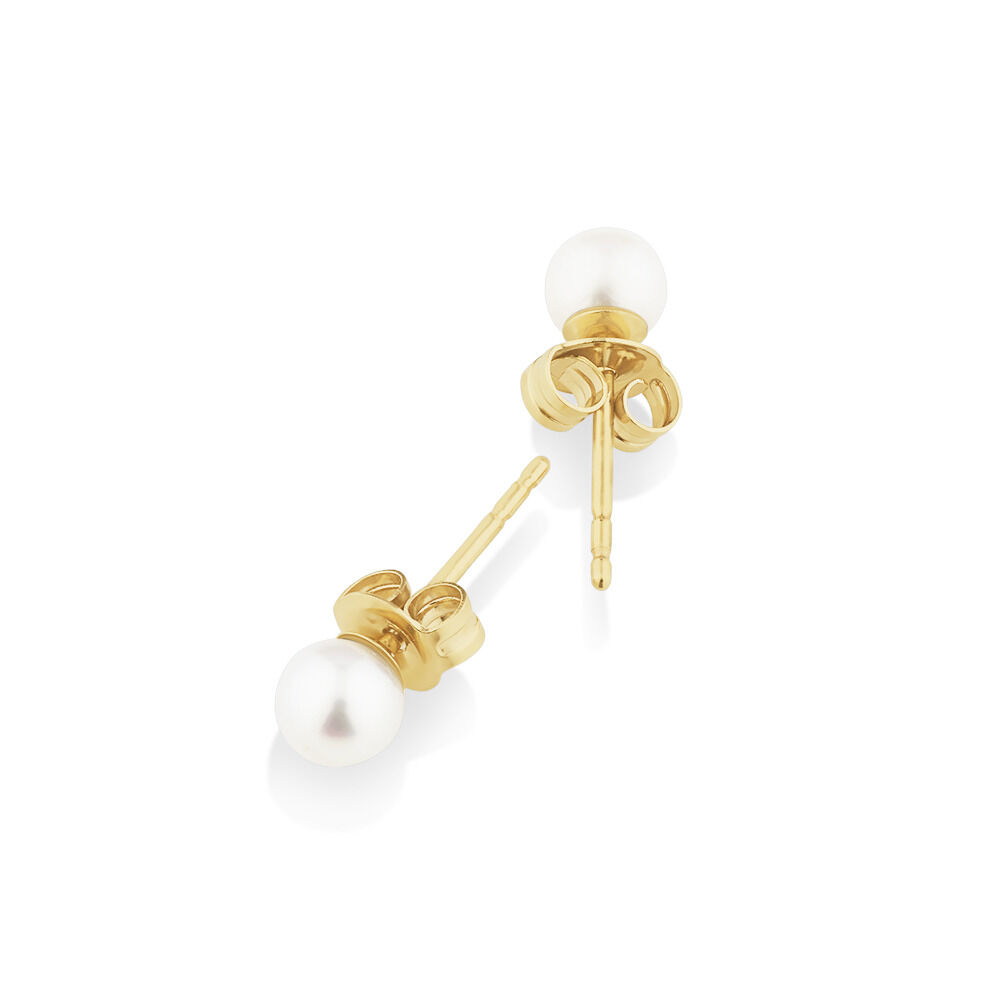 Stud Earrings with 4mm Round Cultured Freshwater Pearl in 10kt Yellow Gold