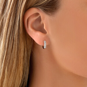 Huggie Earrings With 1/4 Carat TW Of Diamonds In 10kt White Gold