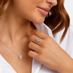 Halo Ring with Aquamarine & 0.29 Carat TW of Diamonds in 10kt White Gold