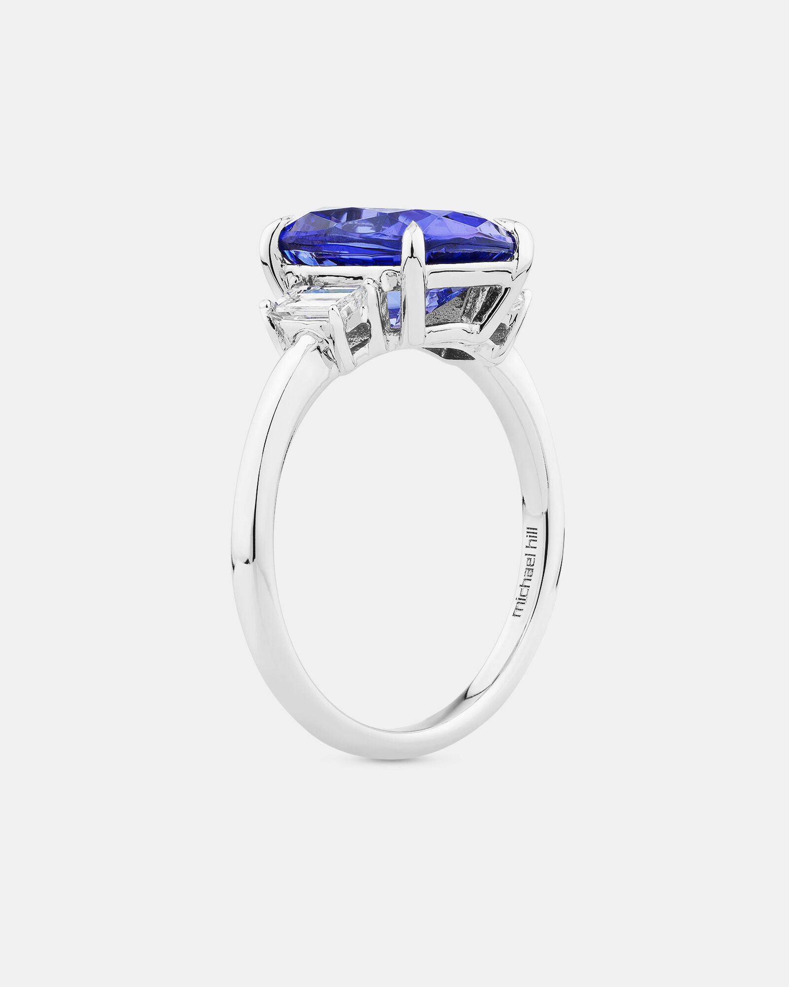 Tanzanite Ring with .30 Carat TW Diamond in 14kt White Gold