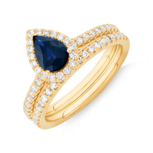 Engagement Ring with Sapphire and 0.51 Carat TW Diamonds in 14kt Yellow Gold