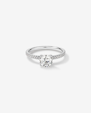 1.14 Carat TW of Diamonds Engagement Ring with a 1 Carat Round Centre Laboratory-Grown Diamond and shouldered by 0.14 Carat TW of Natural Diamonds in 14kt White Gold