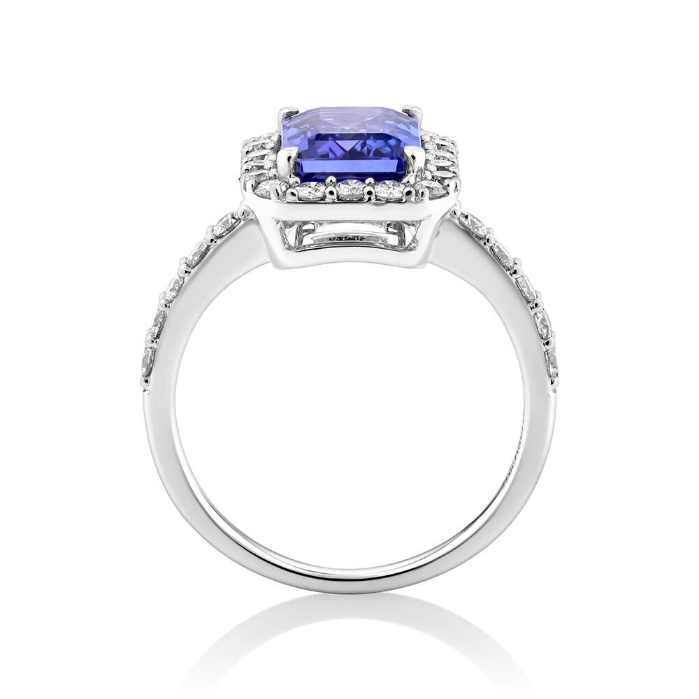 Halo Ring with Tanzanite & 0.75 Carat TW of Diamonds in 14kt White Gold