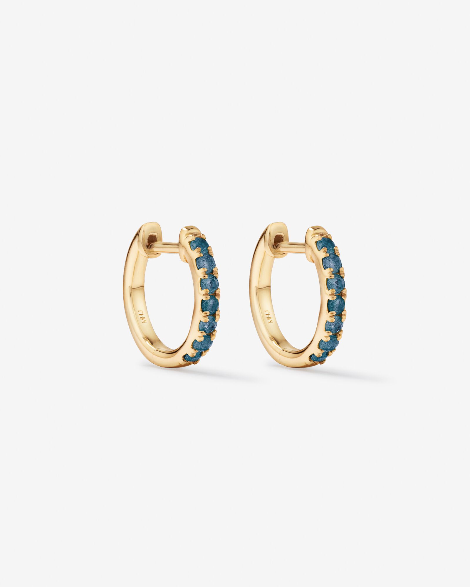 Gold and ruby hoop earrings top