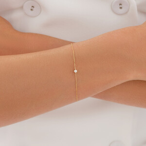 Bracelet à pierre de naissance en or jaune 10 K avec diamants totalisant 0,08 ct