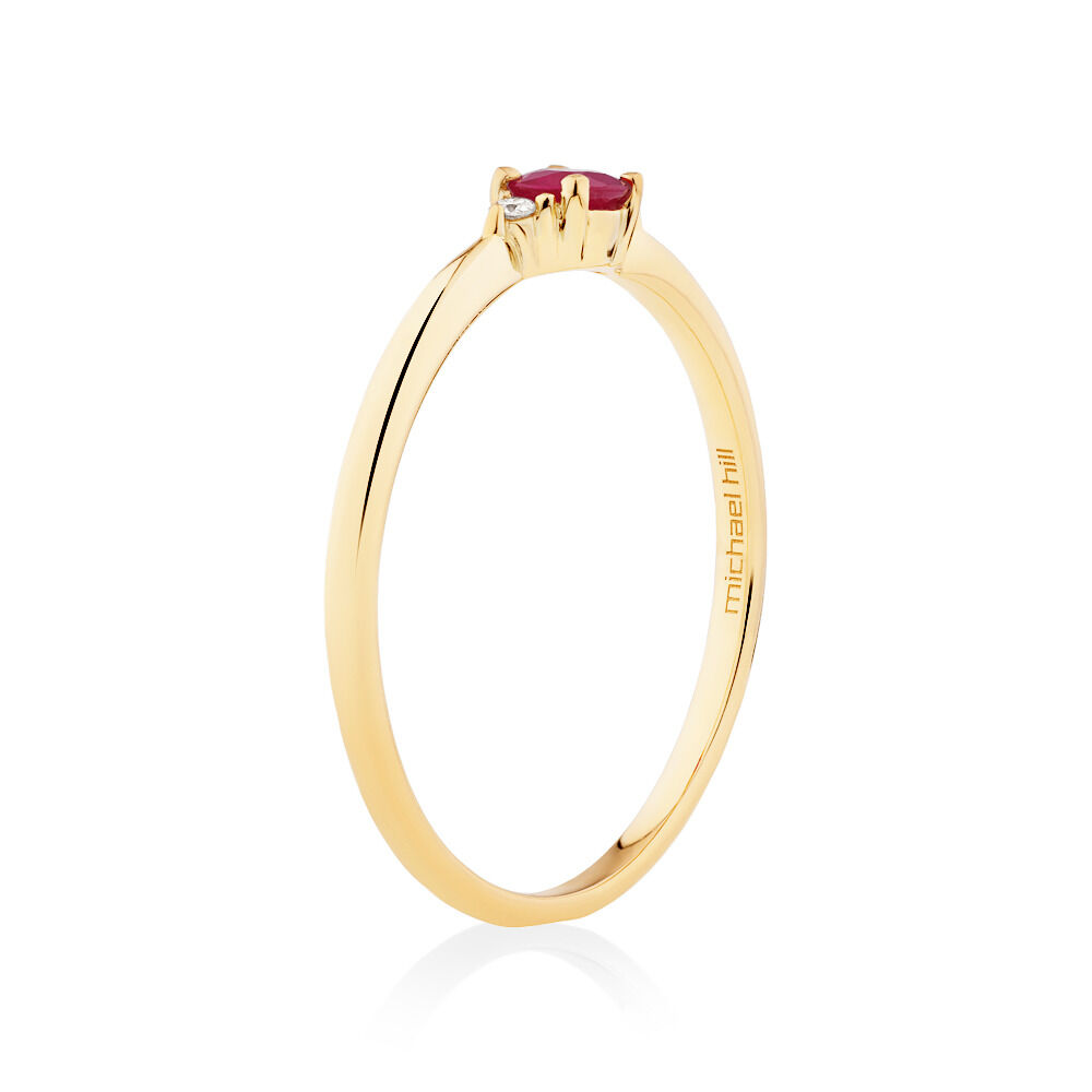 3 Stone Ring with Ruby & Diamonds in 10kt Yellow Gold