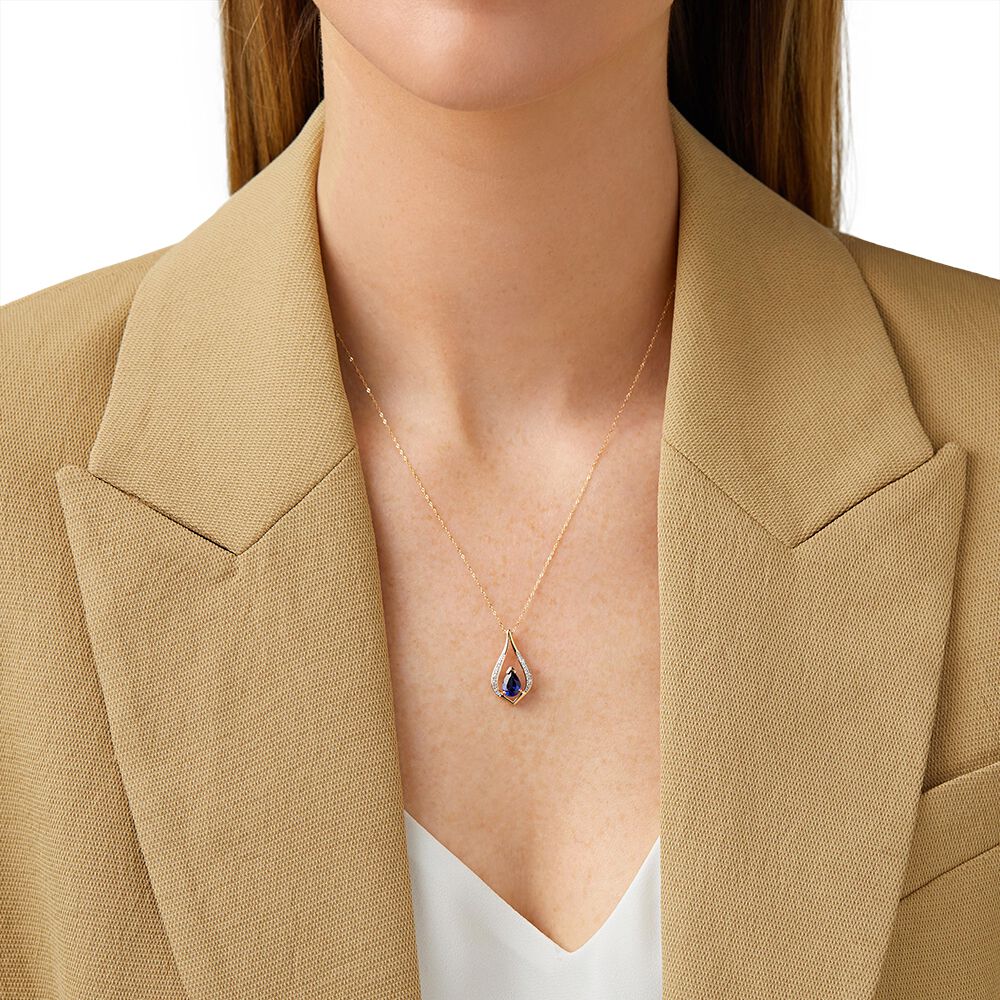Pendant with Laboratory Created Sapphire & Natural Diamonds in 10kt Yellow Gold