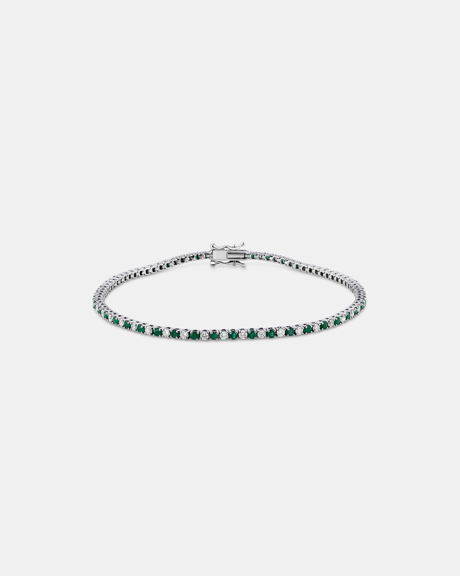 Tennis Bracelet with Emerald and 1 Carat TW of Diamonds in 10kt White Gold