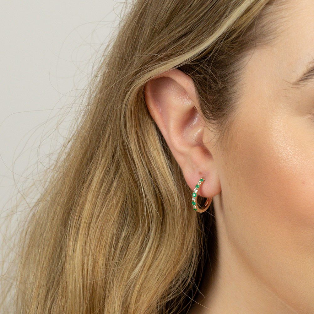 Huggie Earrings with Emerald & 0.20 Carat TW of Diamonds in 10kt Yellow Gold