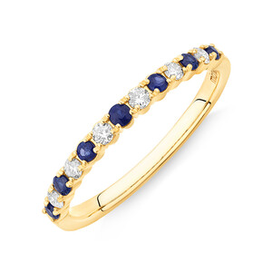 Ring with Blue Sapphire & 1/7 Carat TW of Diamonds in 10kt Yellow Gold