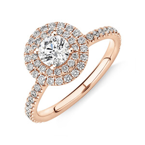 Halo Ring with 0.90 Carat TW of Diamonds in 18kt White Gold
