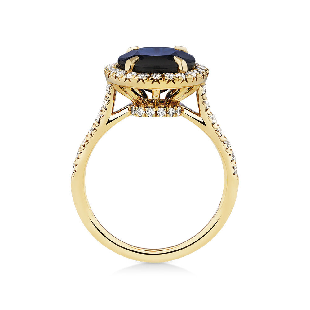 Halo Ring with Sapphire & 0.62 Carat TW of Diamonds in 14kt Yellow Gold