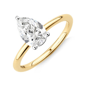Bague de fiançailles solitaire avec un diamant de culture d'1,25 carat (total carat poids) en or jaune et blanc 14 carats.