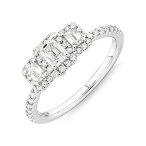 0.80 Carat TW Three Stone Emerald Cut Halo Engagement Ring in 14kt White Gold