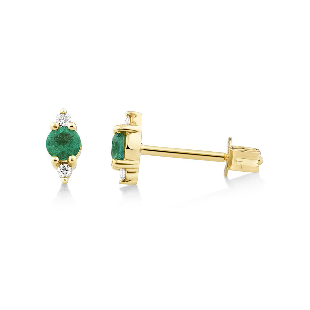 3 Stone Emerald Earrings with .04 Carat TW Diamonds in 10kt Yellow Gold