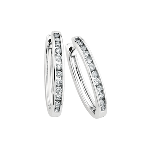 Oval Huggie Earrings with 0.50 Carat TW of Diamonds in 10kt White Gold