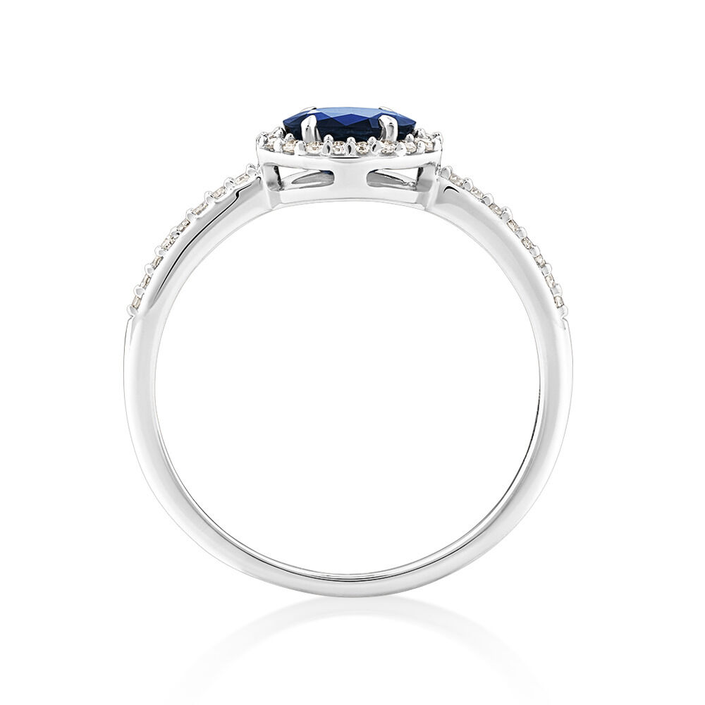 Halo Ring with Sapphire & 0.15 Carat TW of Diamonds in 10kt White Gold