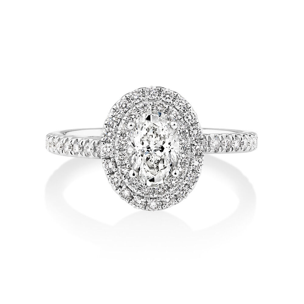 Oval Halo Ring with 0.90 Carat TW of Diamonds in 18kt White Gold