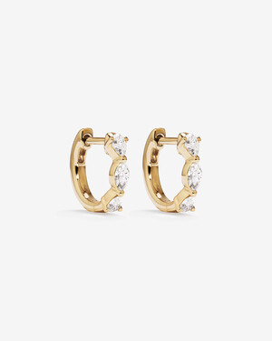Boucles d'oreilles huggie avec diamants de laboratoire de taille fantaisie de 0,36 carat TW en or jaune 10 carats.