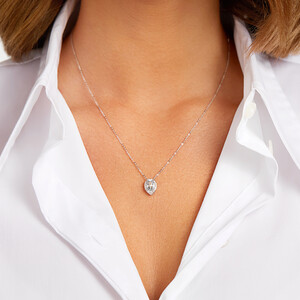 Halo Necklace with Aquamarine & 0.19 Carat TW of Diamonds in 10kt White Gold