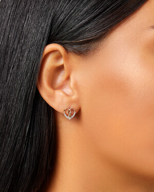 Boucles d'oreilles en forme de cœur avec symbole de l'infini en or jaune 10 K avec diamants totalisant 0,20 ct