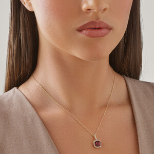 Halo Pendant with Pink Tourmaline & 0.22 Carat TW of Diamonds in 14kt Yellow Gold