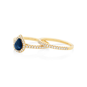 Engagement Ring with Sapphire and 0.51 Carat TW Diamonds in 14kt Yellow Gold