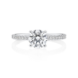 Engagement Ring with 1.14 Carat TW of Diamonds. A 1 Carat Round Brilliant Centre Laboratory-Created Diamond and shouldered by 0.14 Carat TW of Natural Diamonds in 14kt White Gold